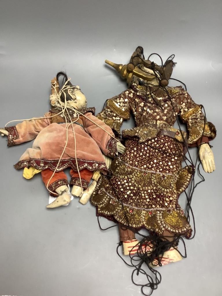 Two Burmese puppets, tallest 60cm